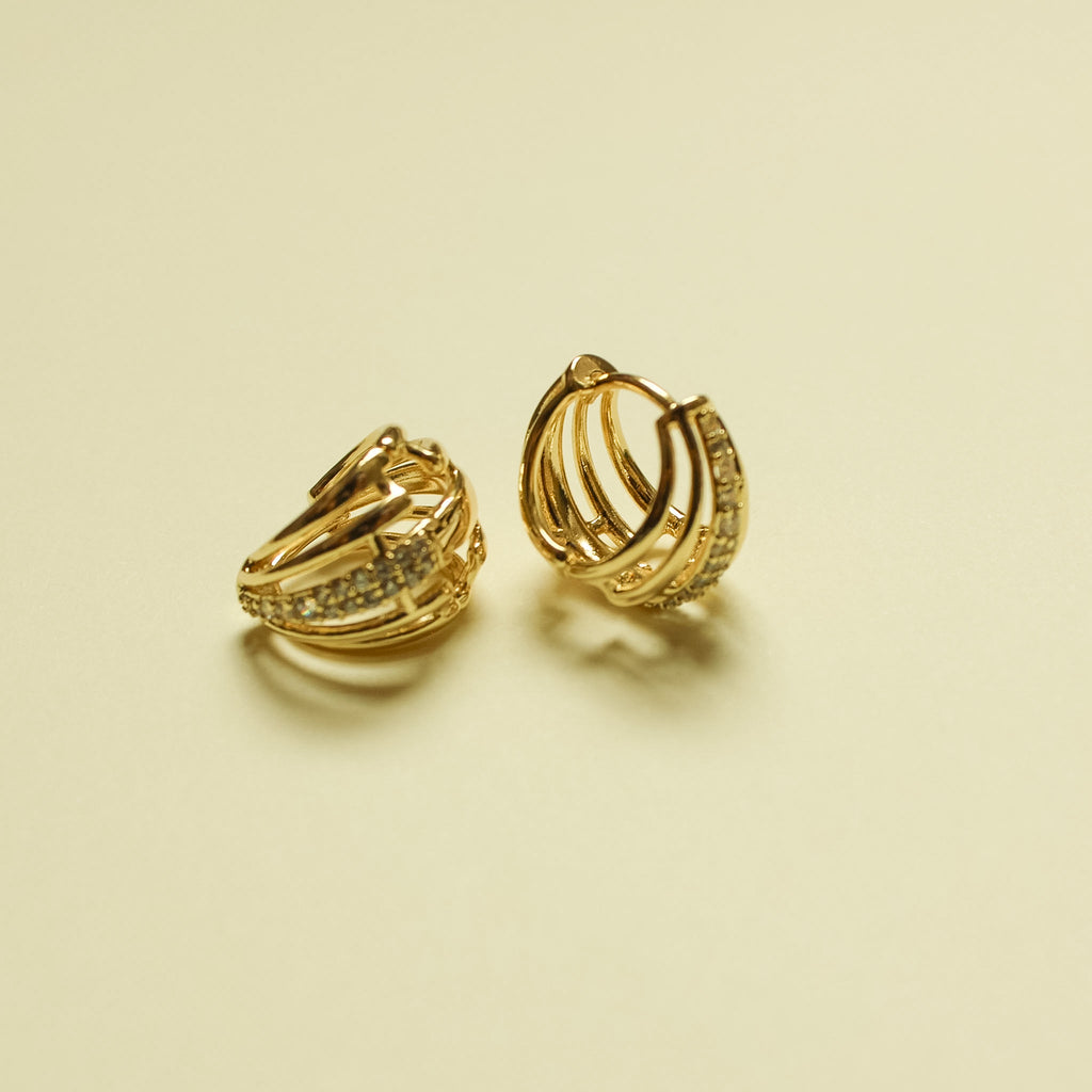 Wide Pavé CZ Huggie Hoop Earrings 14K Gold — pair showing open inner hoop structure
