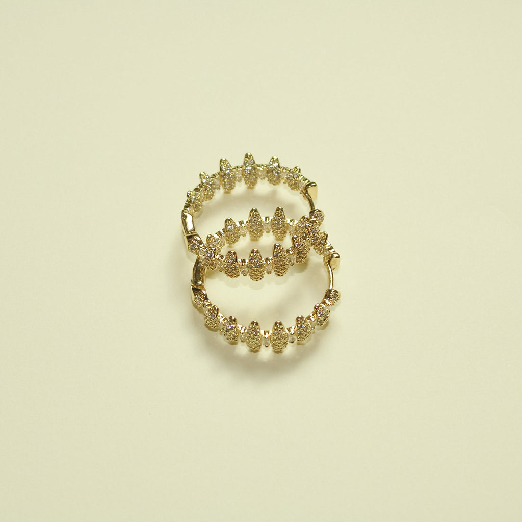 Pavé CZ Spike Hoop Earrings 14K Gold — pair overlapping flat lay