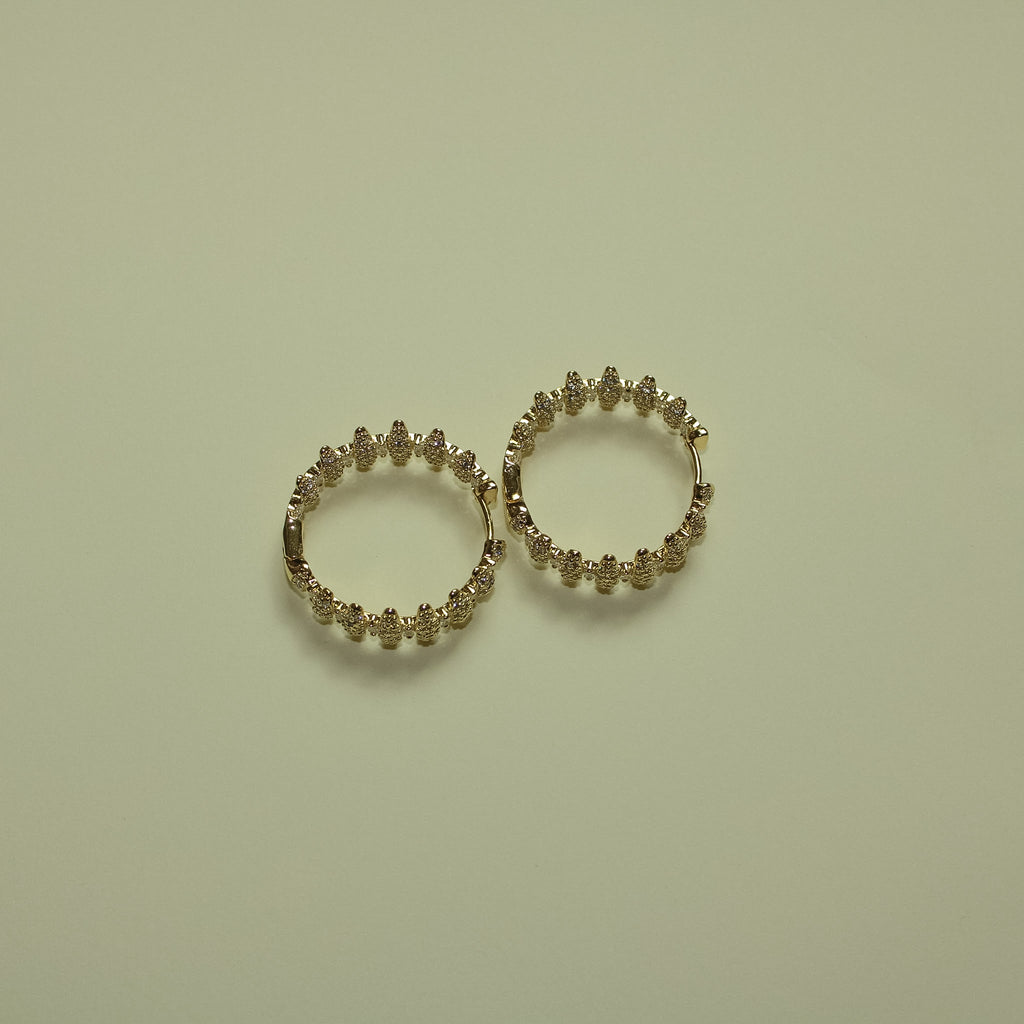 Pavé CZ Spike Hoop Earrings 14K Gold — pair separated flat lay
