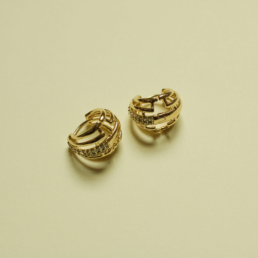Wide Pavé CZ Huggie Hoop Earrings 14K Gold — pair angled close-up CZ and lattice detail