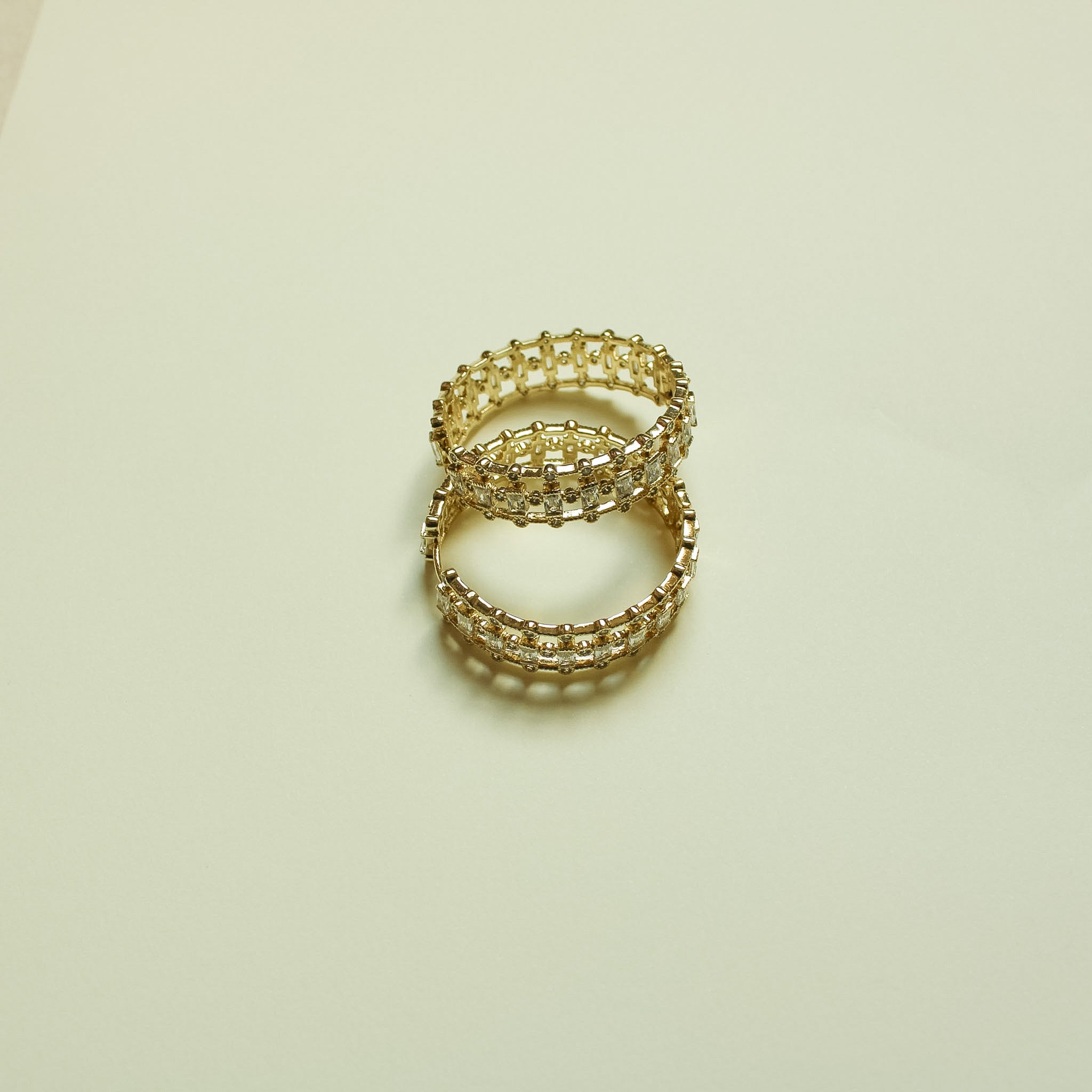 Mixed Cut CZ Inside-Out Hoop Earrings Gold — pair stacked angled top view