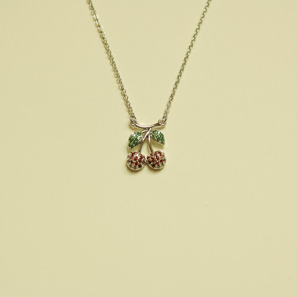 Pavé CZ Cherry Pendant Necklace Silver — full necklace flat lay alternate angle