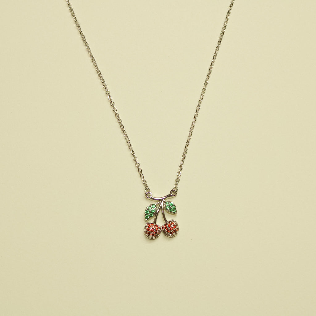 Pavé CZ Cherry Pendant Necklace Silver — full necklace flat lay showing chain and cherry charm
