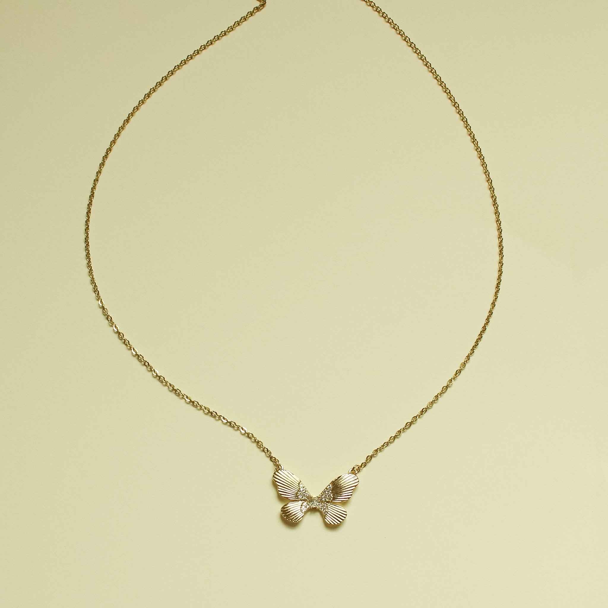 Fluted Butterfly CZ Necklace 14K Gold — full necklace flat lay showing chain drape
