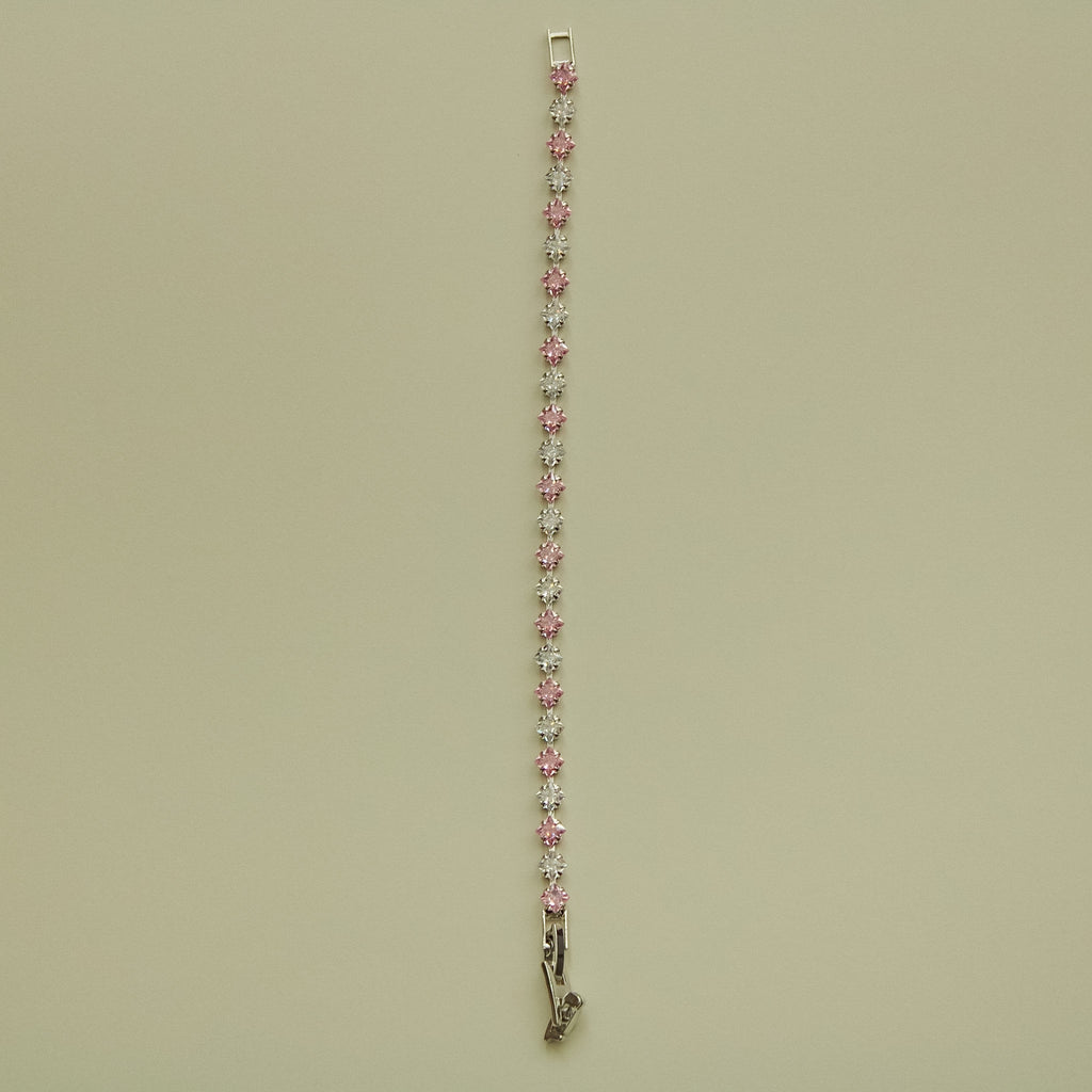Tennis bracelet with pink and clear princess-cut CZ stones in a row