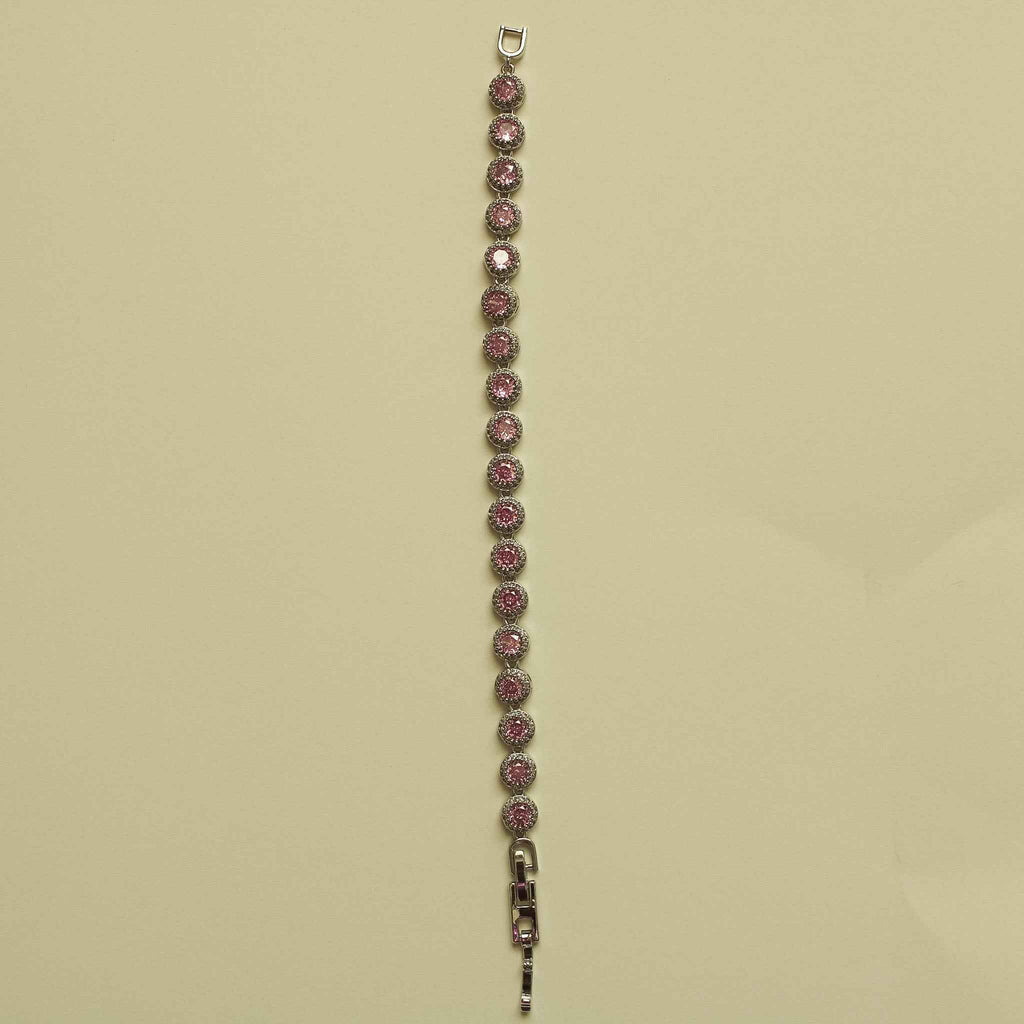 Pink halo CZ tennis bracelet with small loop clasp and row of round stones