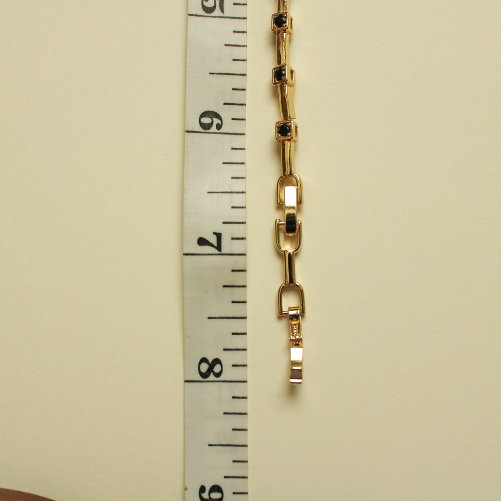 Black CZ Bezel Station Gold Bar Bracelet