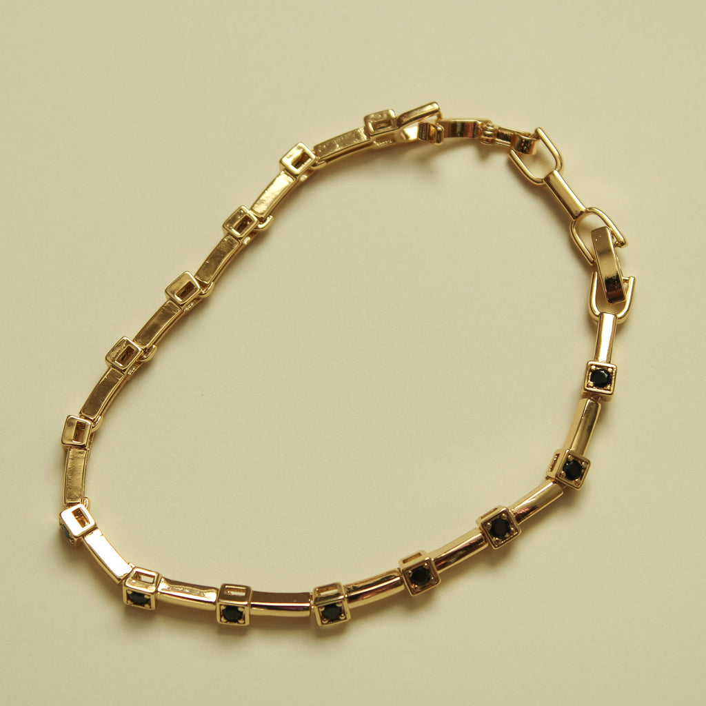 Black CZ Bezel Station Gold Bar Bracelet