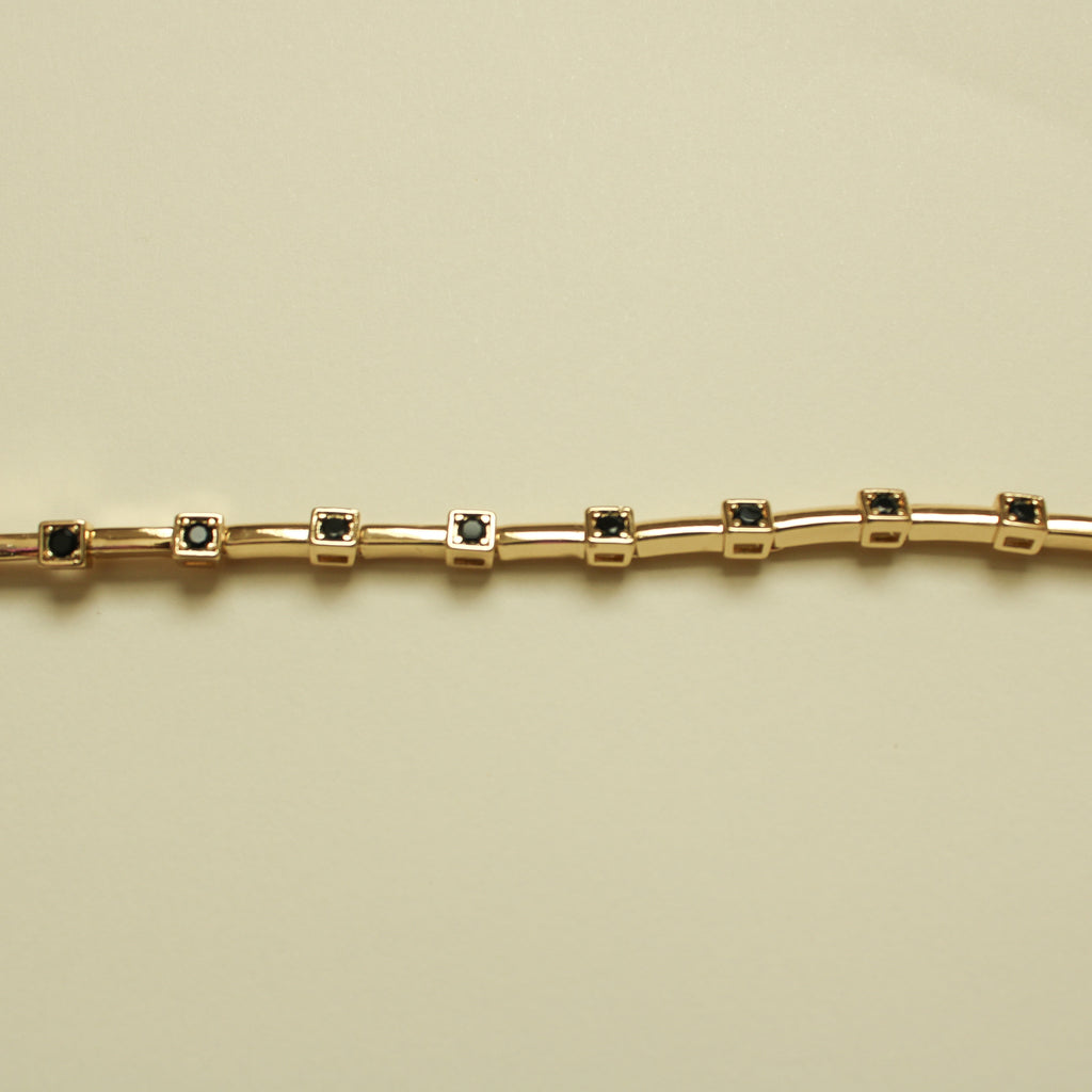 Black CZ Bezel Station Gold Bar Bracelet