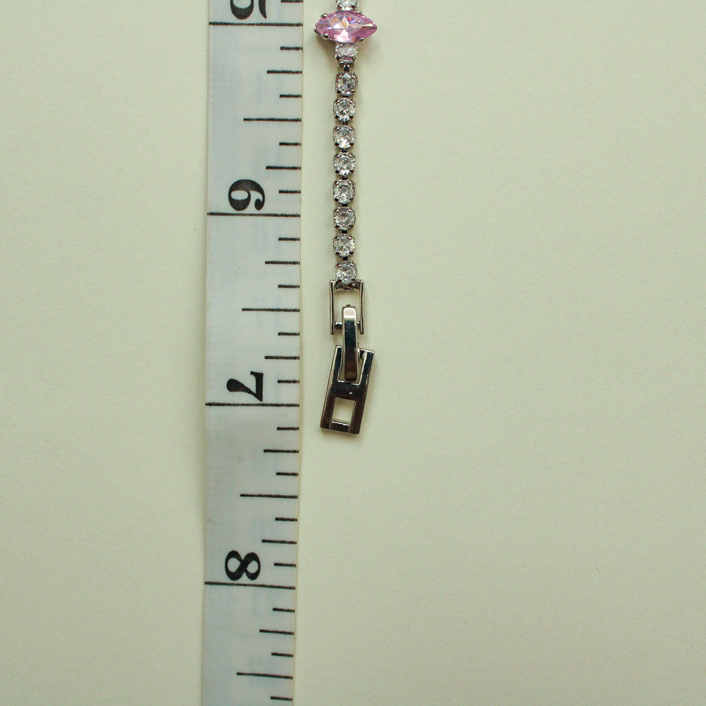 Pink marquise and clear CZ tennis bracelet shown with box clasp, side view