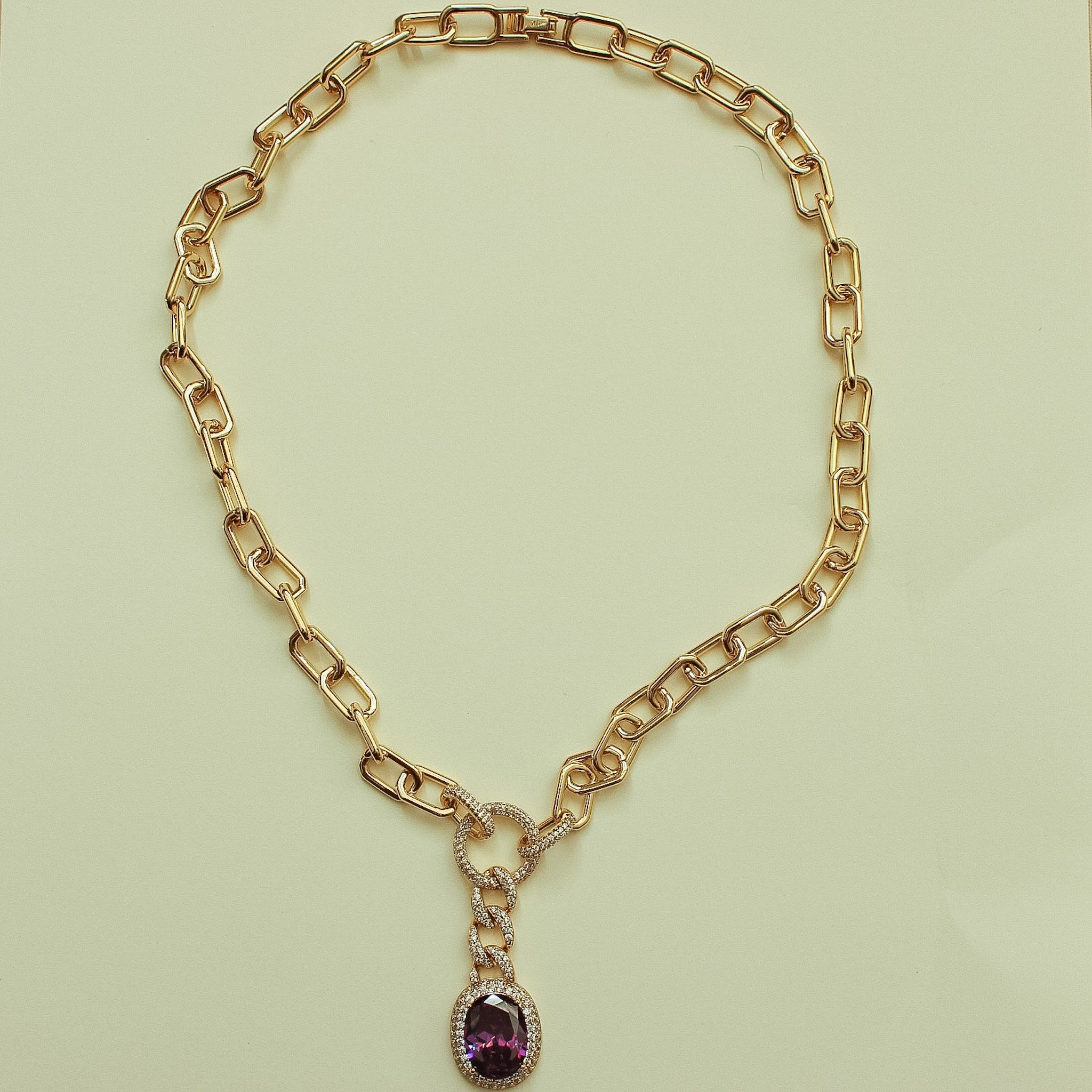 Gold paperclip chain necklace with amethyst-style purple gemstone drop pendant
