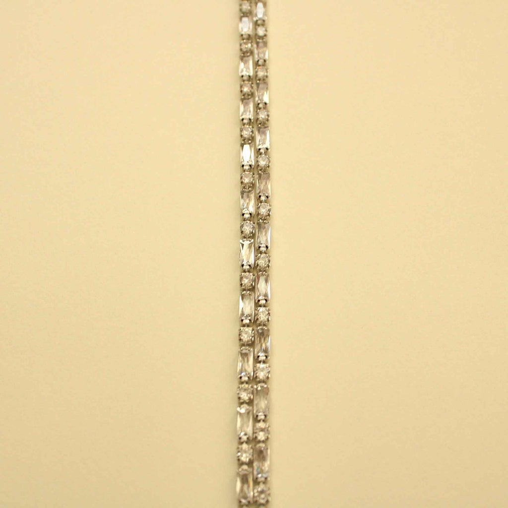 Double-row tennis bracelet with repeating clear CZ stones, silver-tone metal links