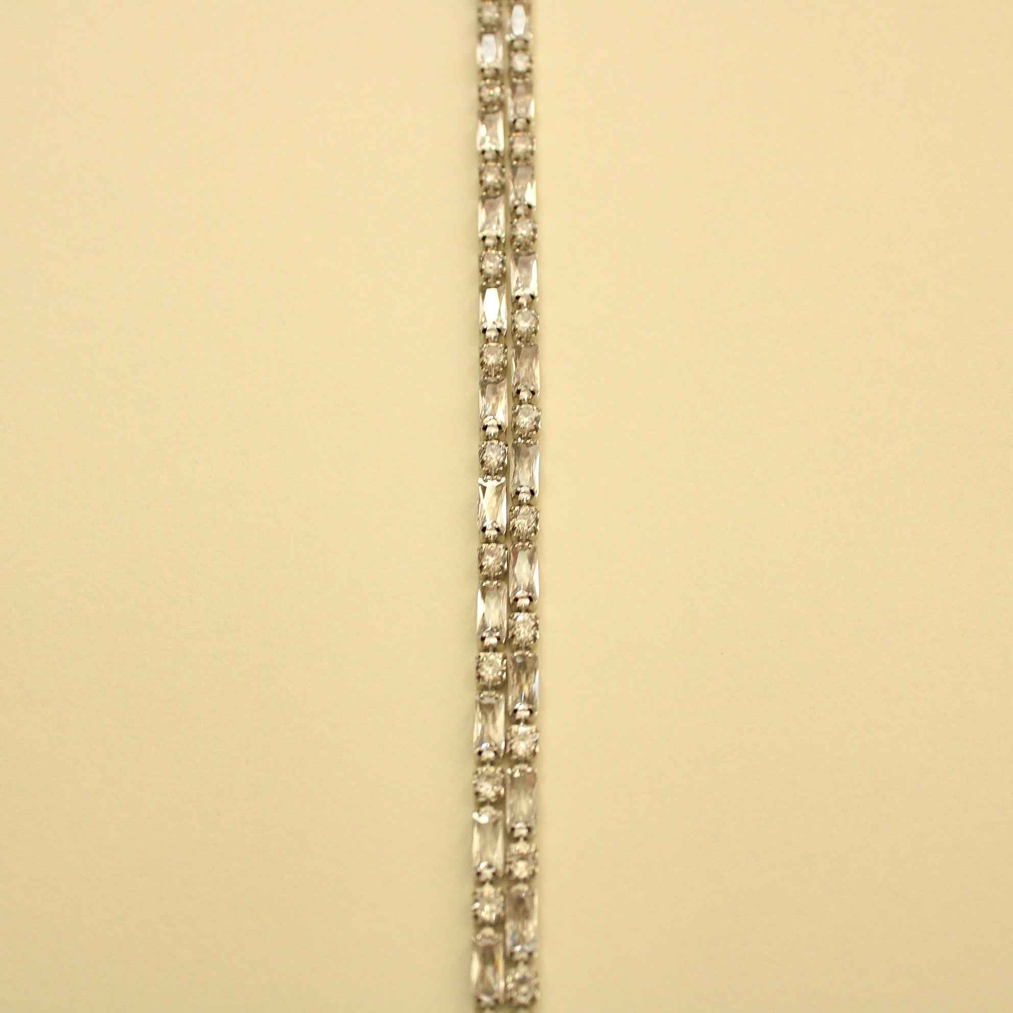 Double-row tennis bracelet with repeating clear CZ stones, silver-tone metal links