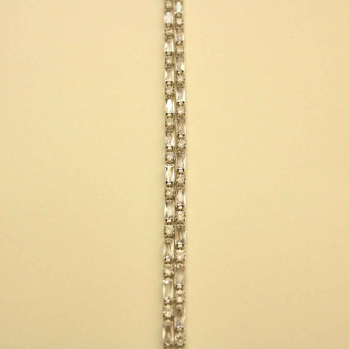 Double-row tennis bracelet with repeating clear CZ stones, silver-tone metal links