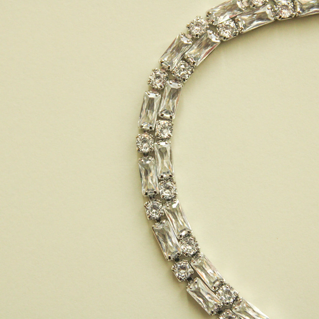 Double-row tennis bracelet with clear baguette CZ stones, silver-tone setting