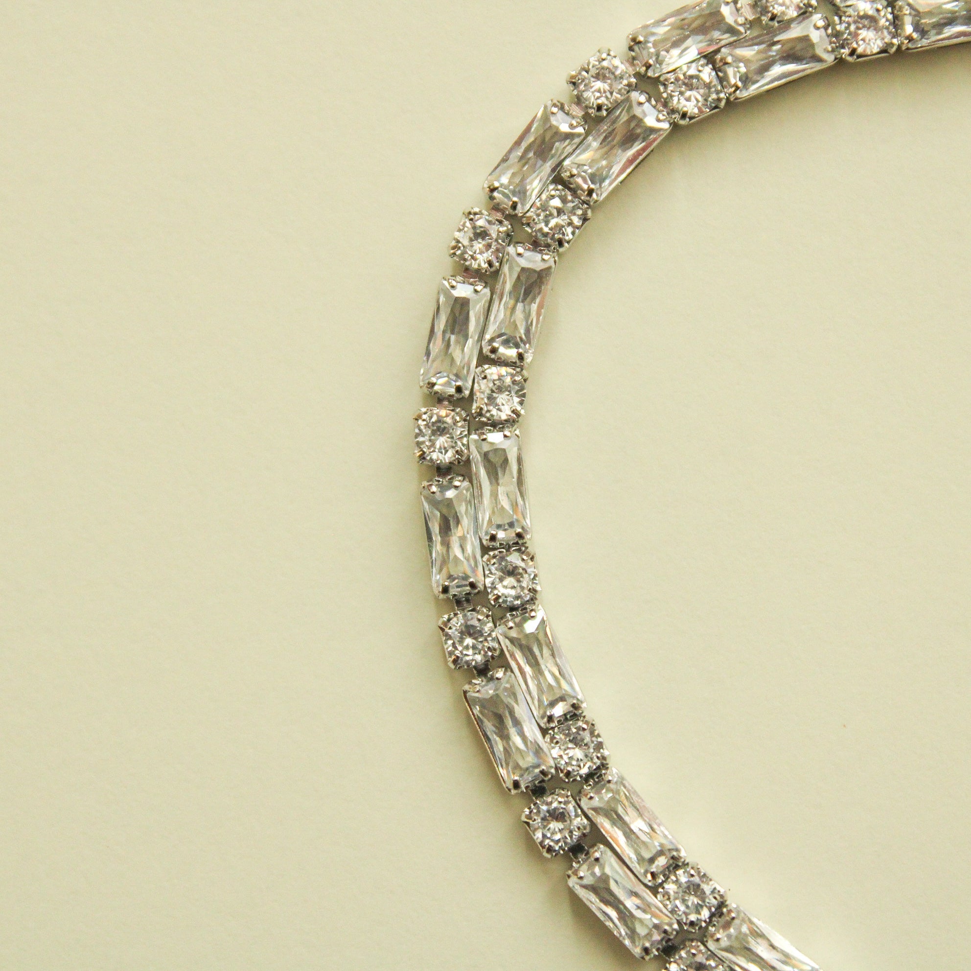 Double-row tennis bracelet with clear baguette CZ stones, silver-tone setting