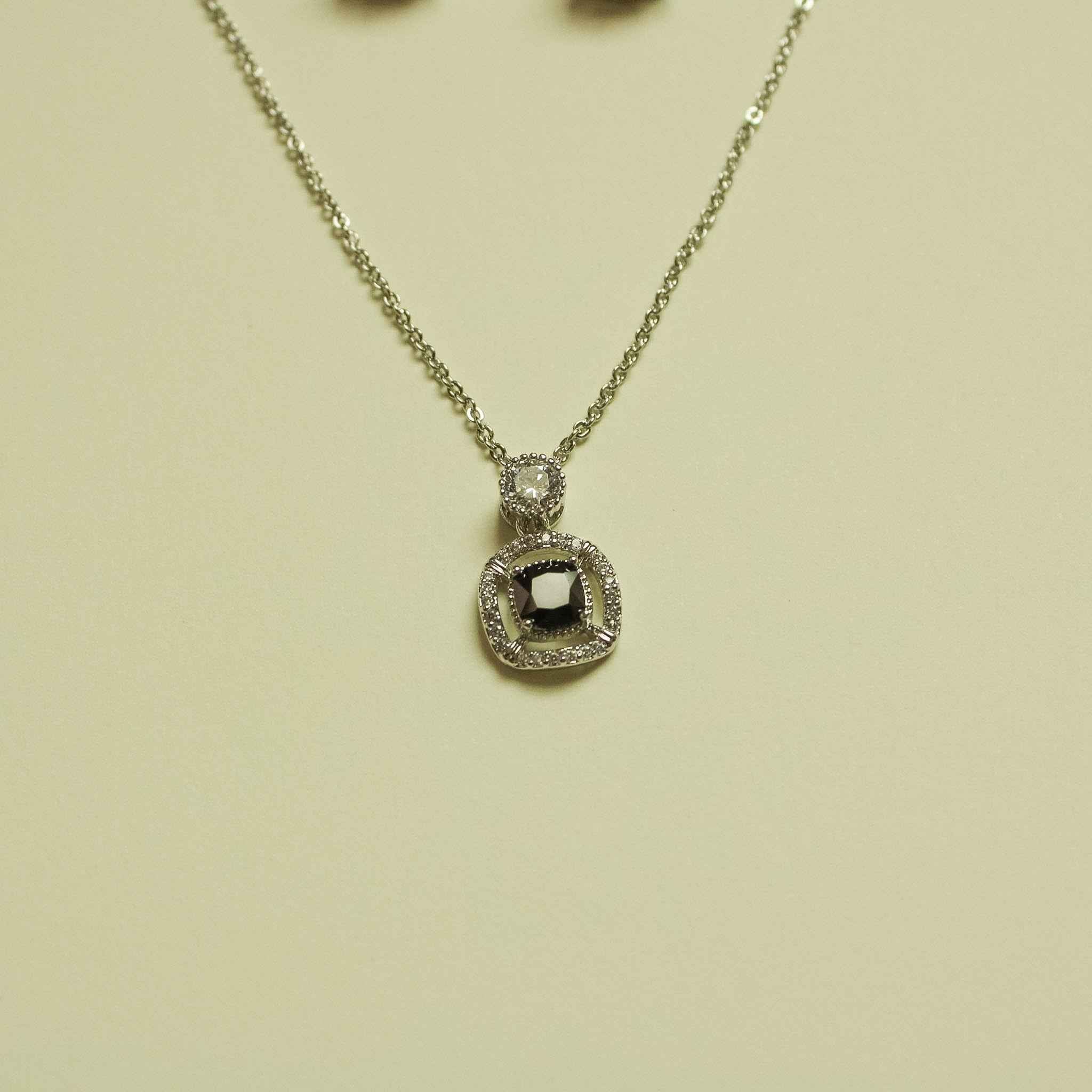 Black CZ halo pendant necklace with round pendant and thin chain