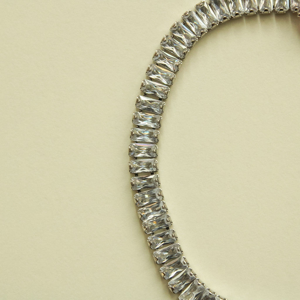 Silver CZ baguette tennis bracelet with continuous baguette-stone row