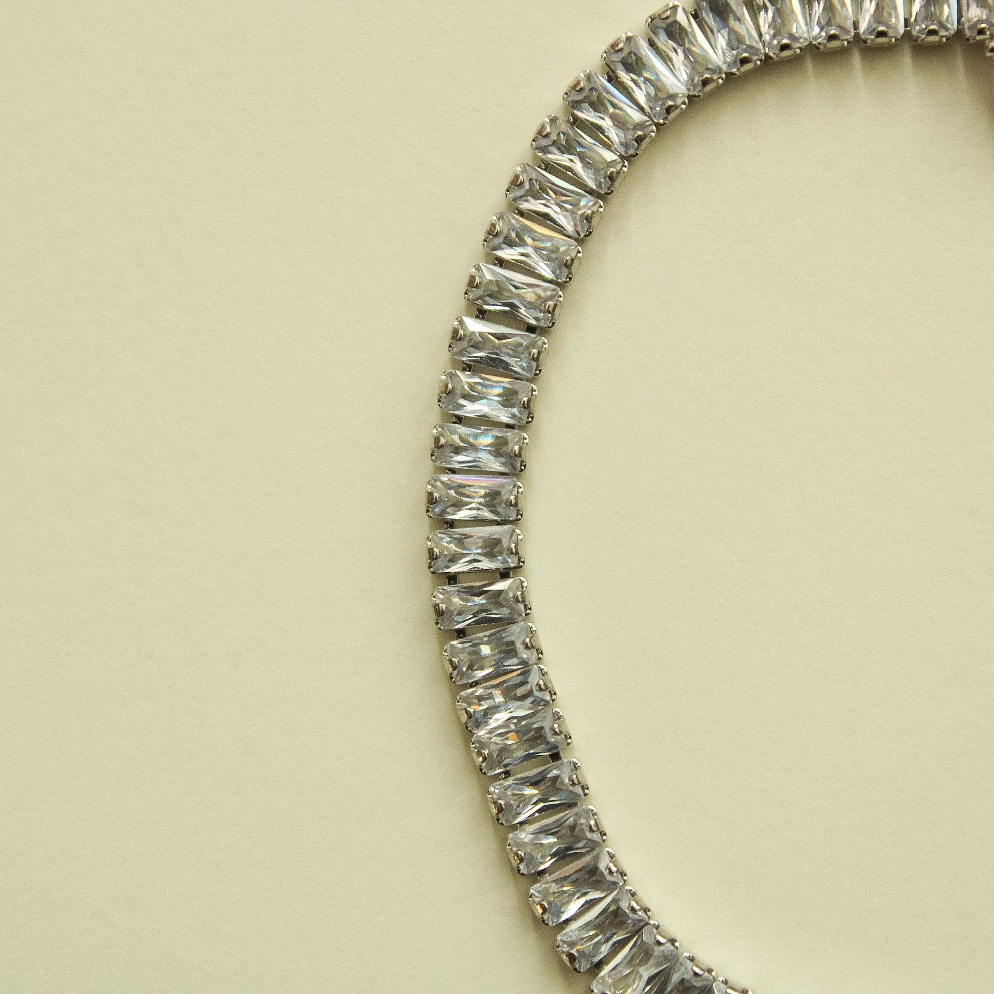 Silver CZ baguette tennis bracelet with continuous baguette-stone row