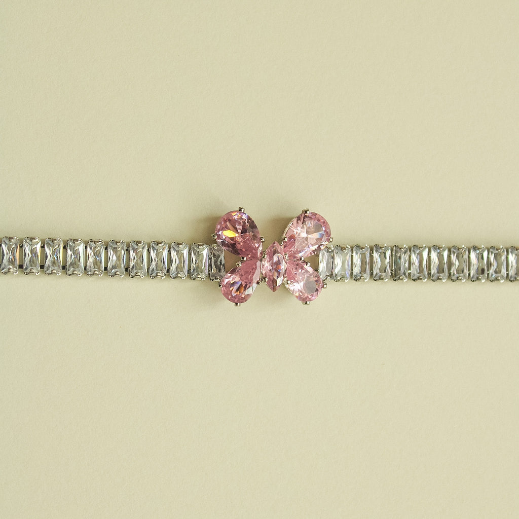 CZ baguette bracelet with pink butterfly crystal center on silver rhinestone links