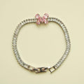 Silver CZ baguette bracelet with pink butterfly bow and hinged clasp