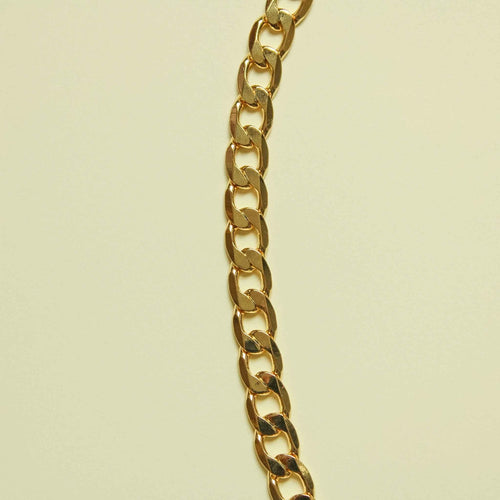 Chunky Cuban link 14K gold chain necklace, side view of thick polished links