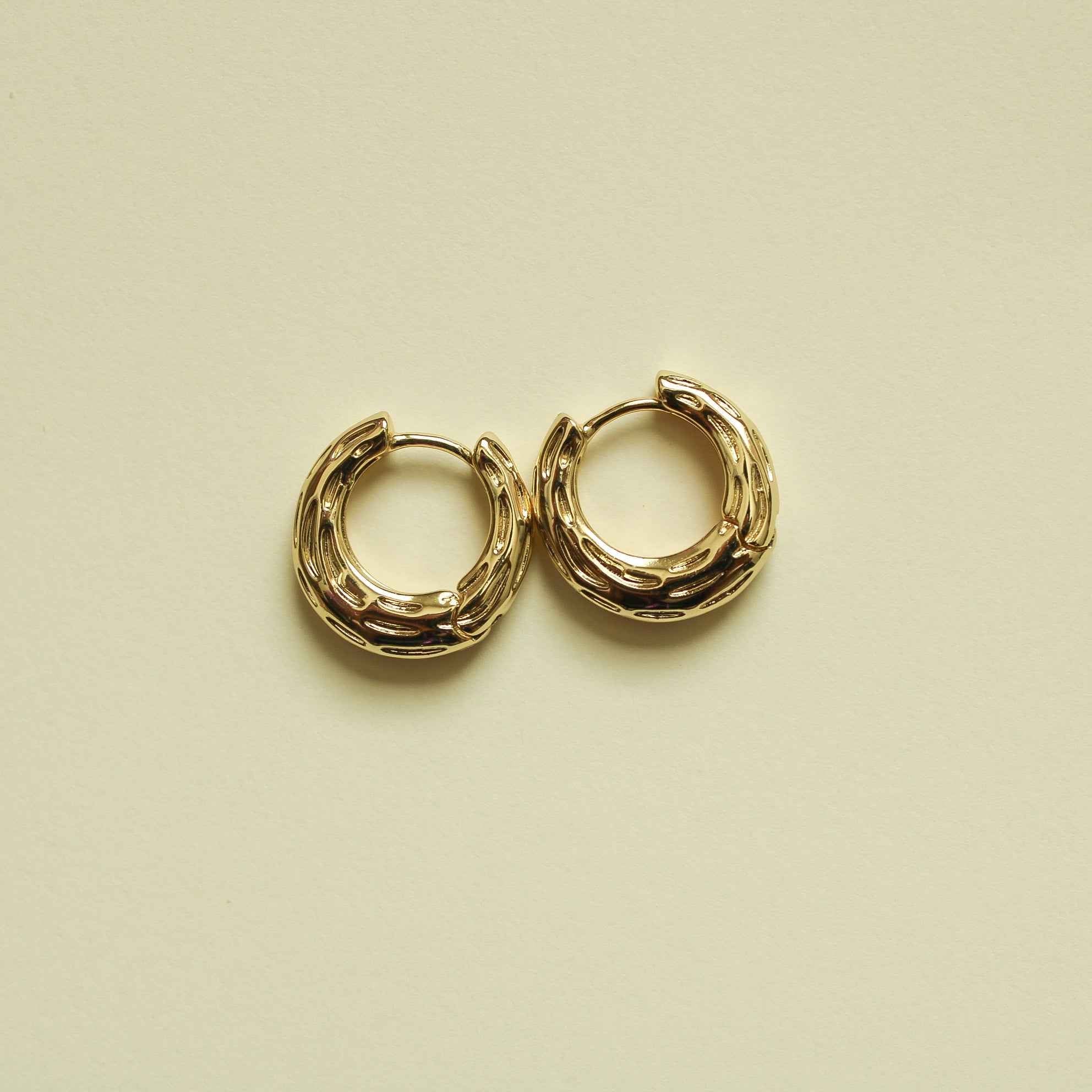 Gold textured huggie hoop earrings, pair of rounded chunky hoops