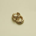 Gold chunky textured huggie hoop earrings, stacked oval-link style