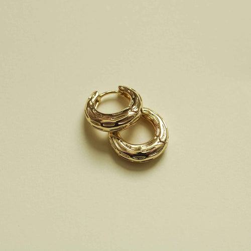 Gold chunky textured huggie hoop earrings, stacked oval-link style