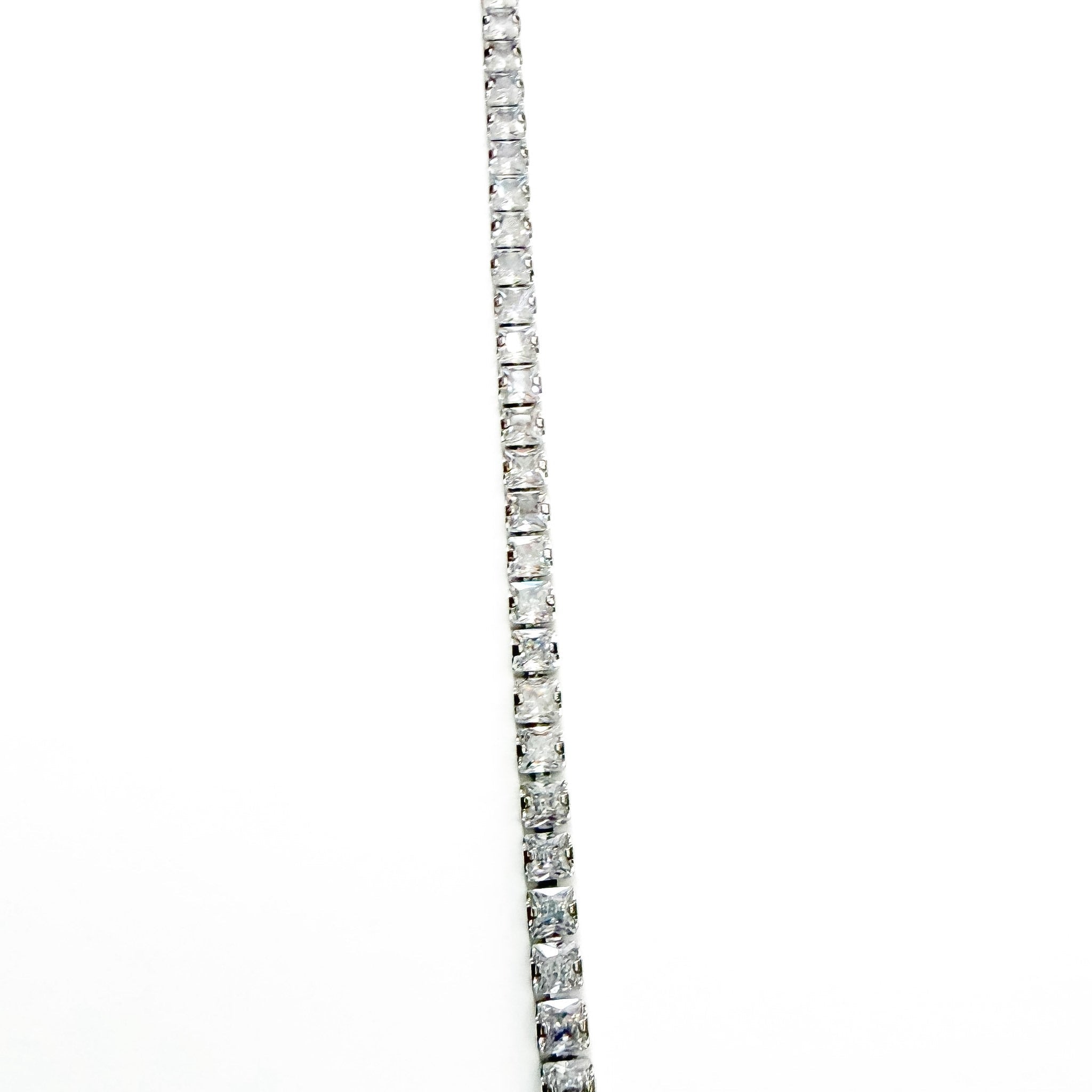 CZ tennis bracelet with continuous row of clear square stones