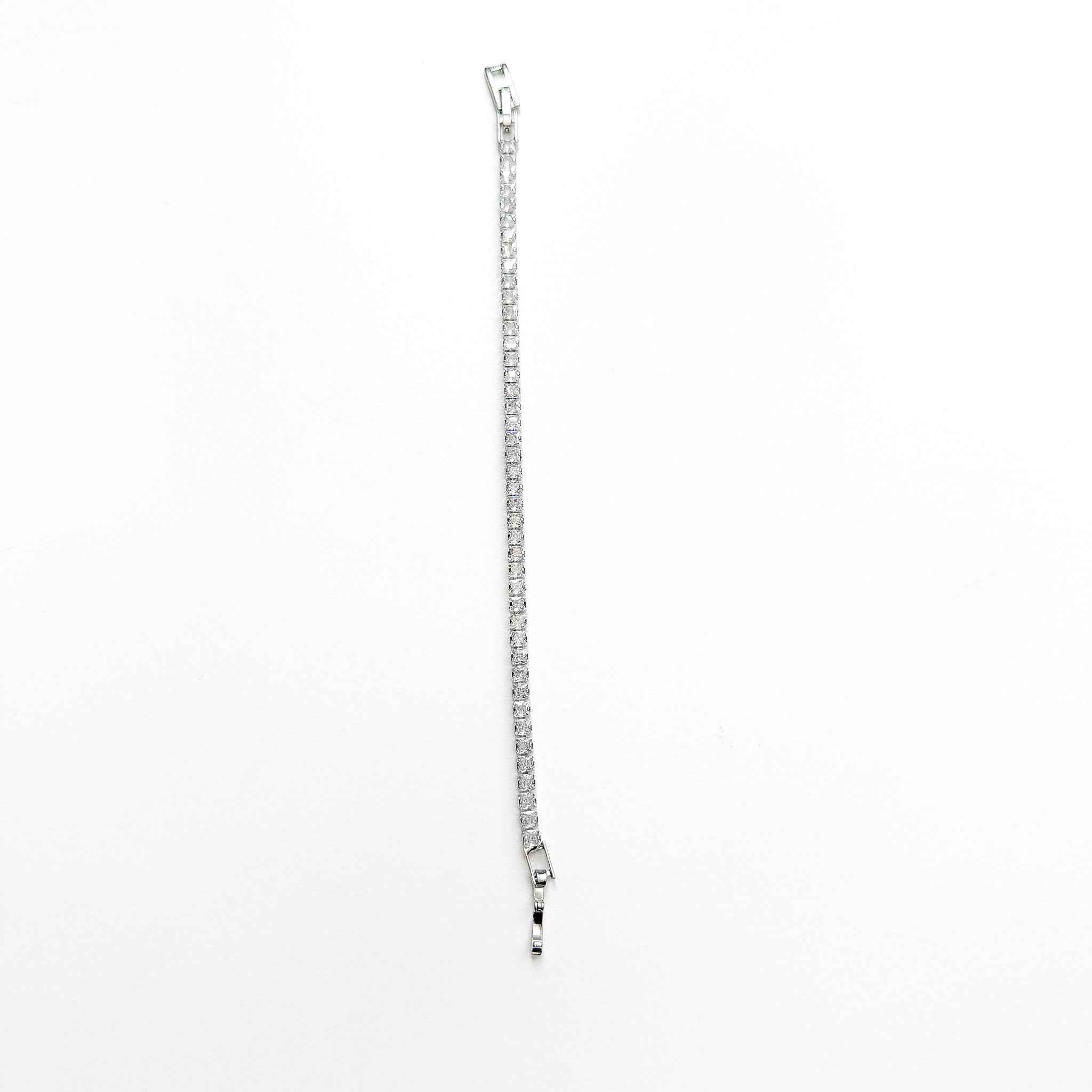 CZ tennis bracelet with clear stone row and small end clasp