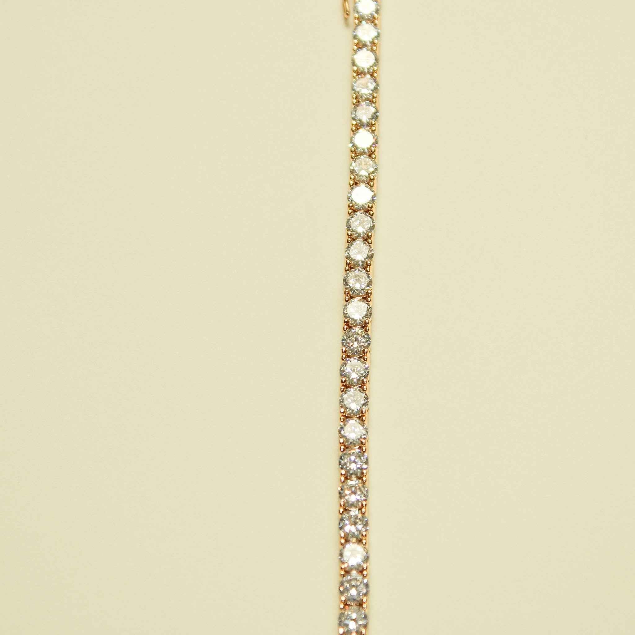 Rose gold-plated tennis necklace with bright round CZ stones, close-up row