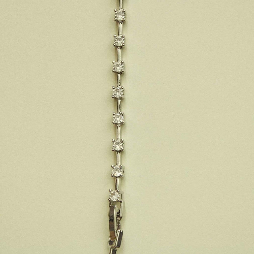 Clear CZ station bracelet with a line of small round clear stones and box clasp