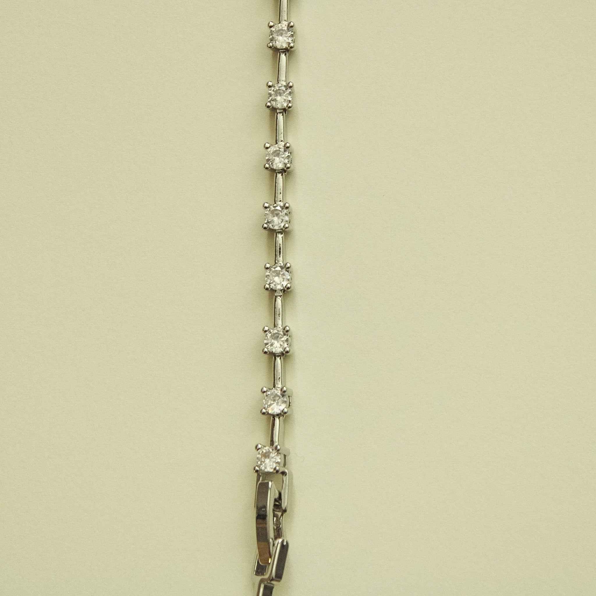 Clear CZ station bracelet with a line of small round clear stones and box clasp