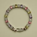 Tennis bracelet with round multicolor CZ stones in silver-tone settings, hinged clasp