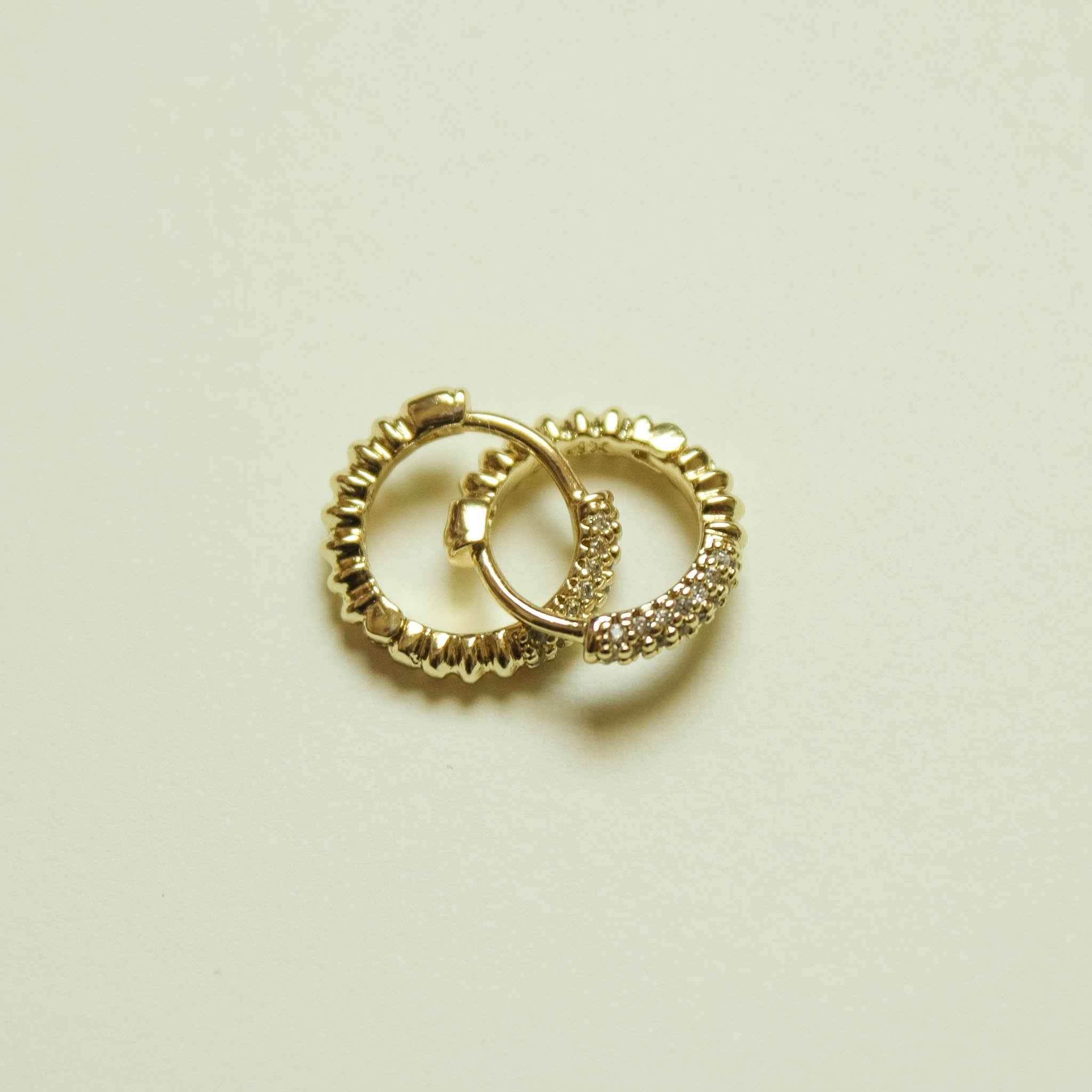 Gold pavé CZ huggie hoop earrings, overlapping pair