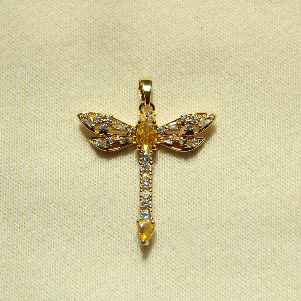 Gold dragonfly pendant with yellow center and clear rhinestone accents
