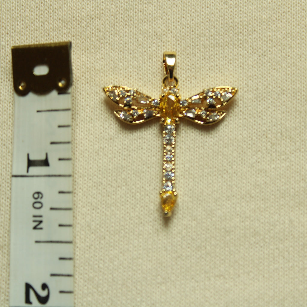 Gold dragonfly pendant with dangling drop and sparkling pavé stones