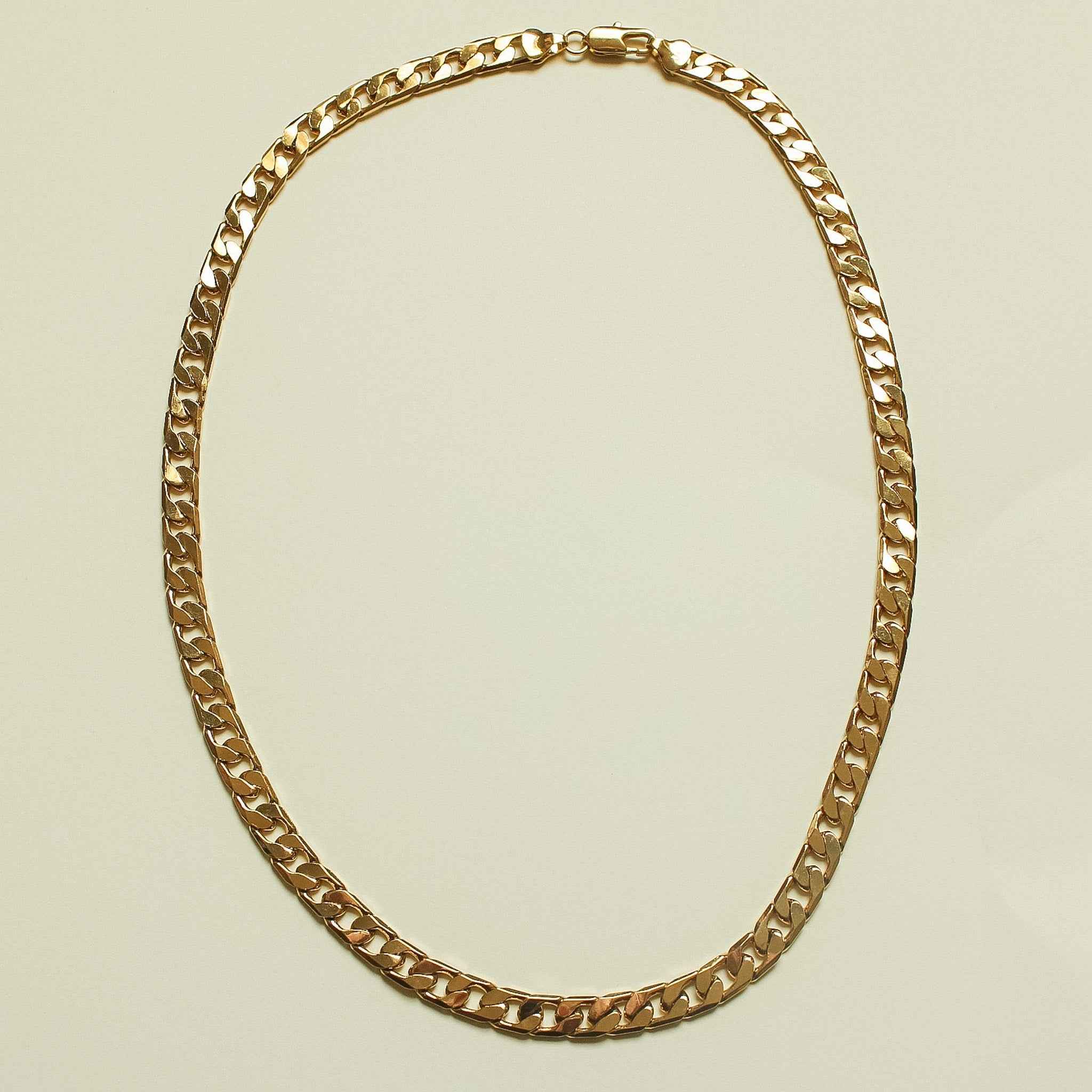 Gold-tone flat Cuban link chain necklace, full oval loop of interlocking links