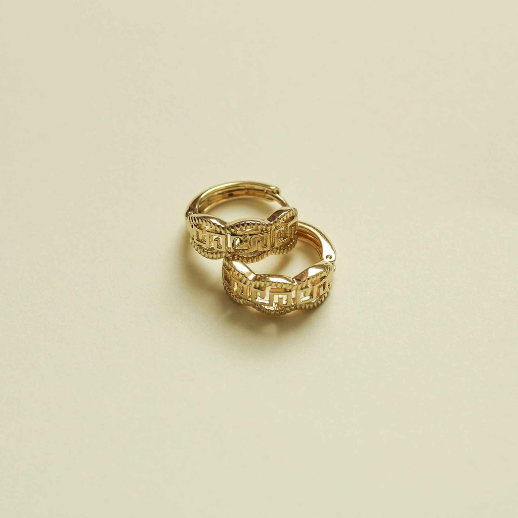Gold huggie hoop earring with Greek key engraved pattern, small round hoop