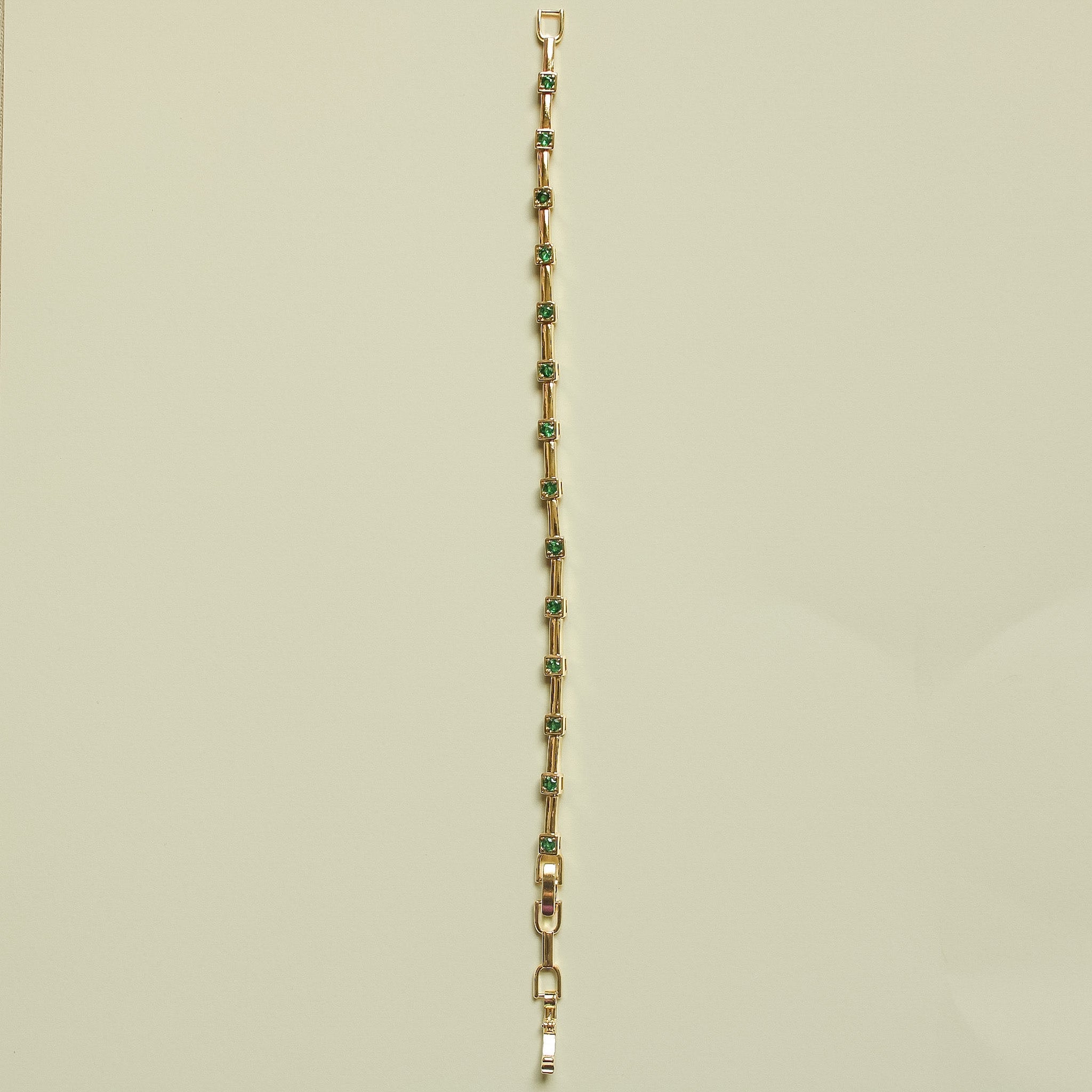 Gold-tone bracelet chain with repeating slim rectangular links