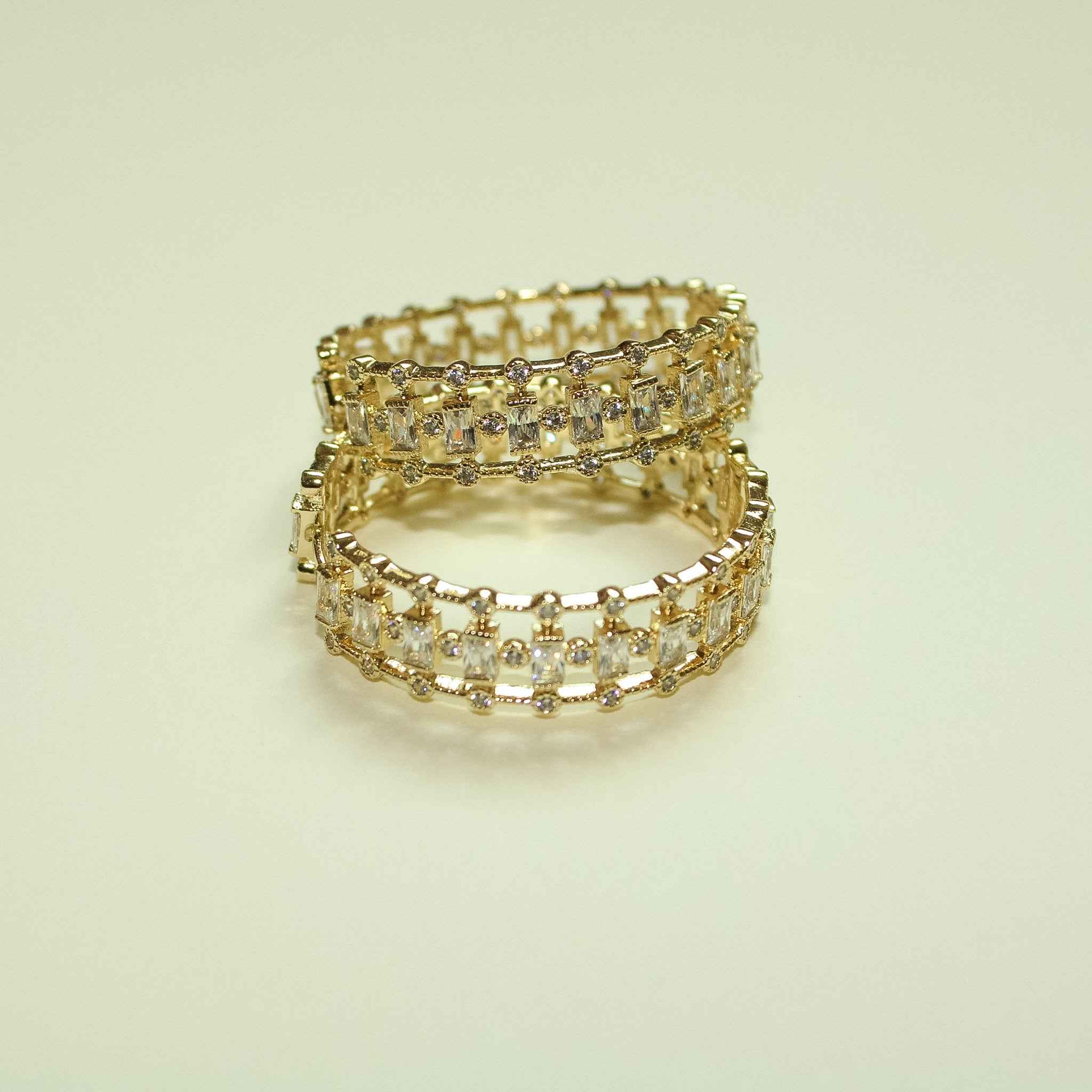 Gold mixed-cut CZ inside-out hoop earrings, stacked pair