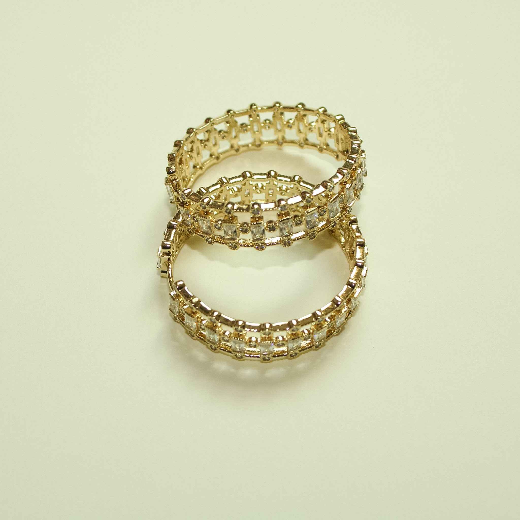 Gold mixed-cut CZ inside-out hoop earrings