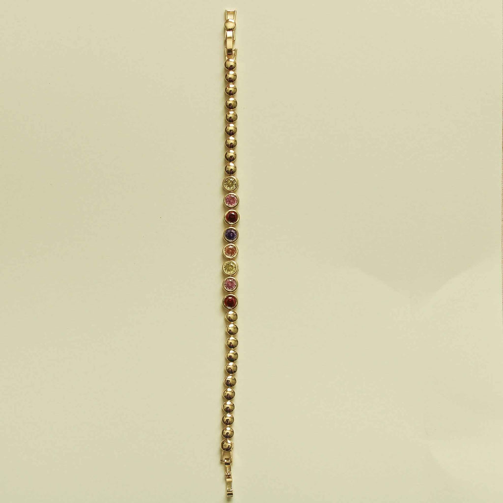 Gold tennis bracelet with slim row of multicolor CZ bezel stones