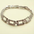 Silver CZ bracelet with open rectangle pavé links