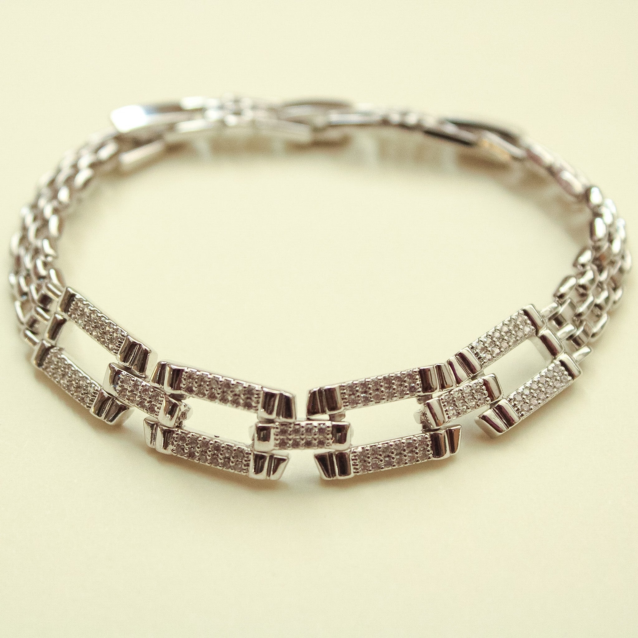 Silver CZ bracelet with open rectangle pavé links
