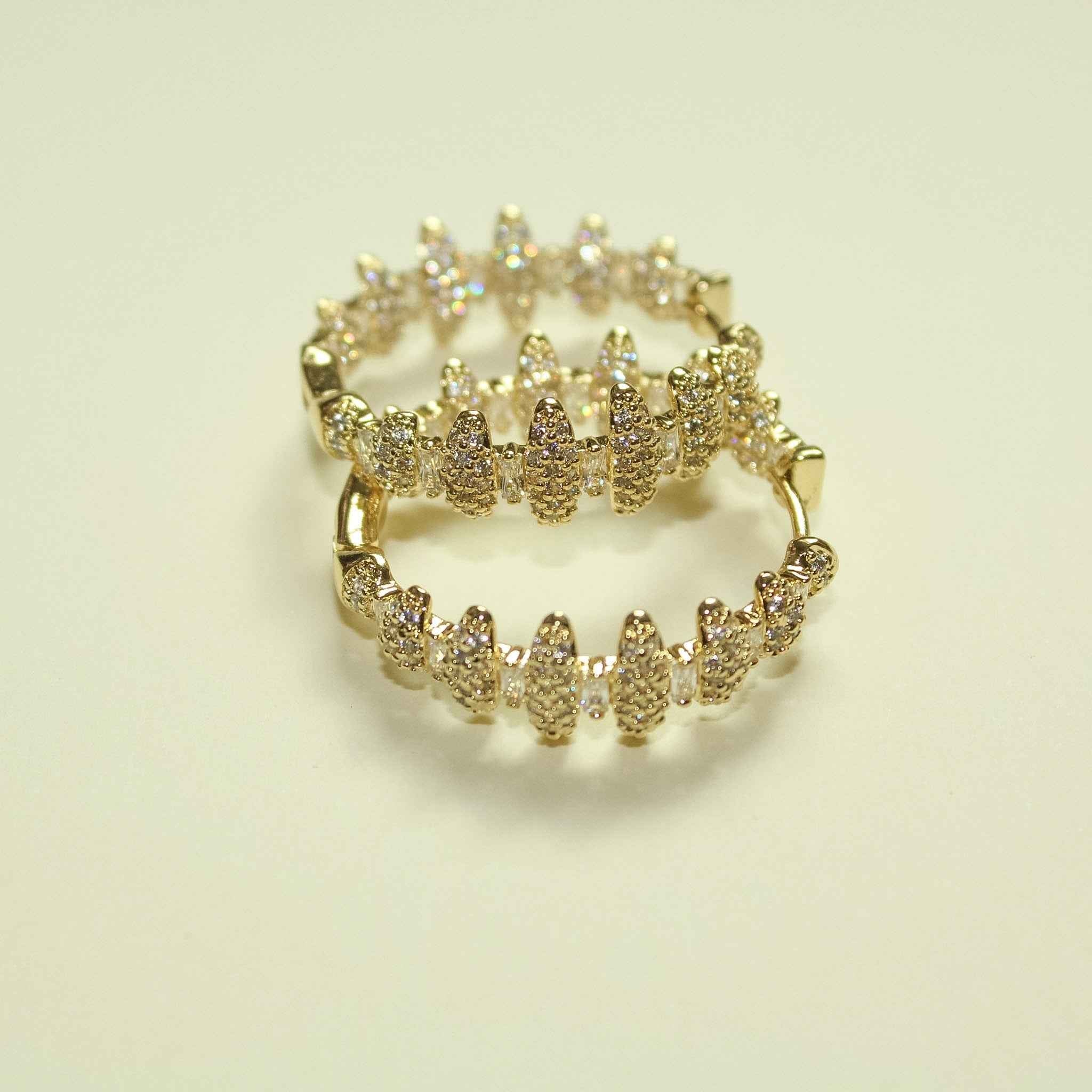 14K gold pavé CZ spike hoop earrings, shown stacked