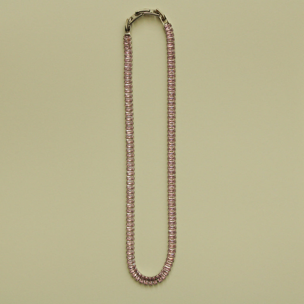 Pink baguette tennis necklace with faceted stones and box clasp, full length