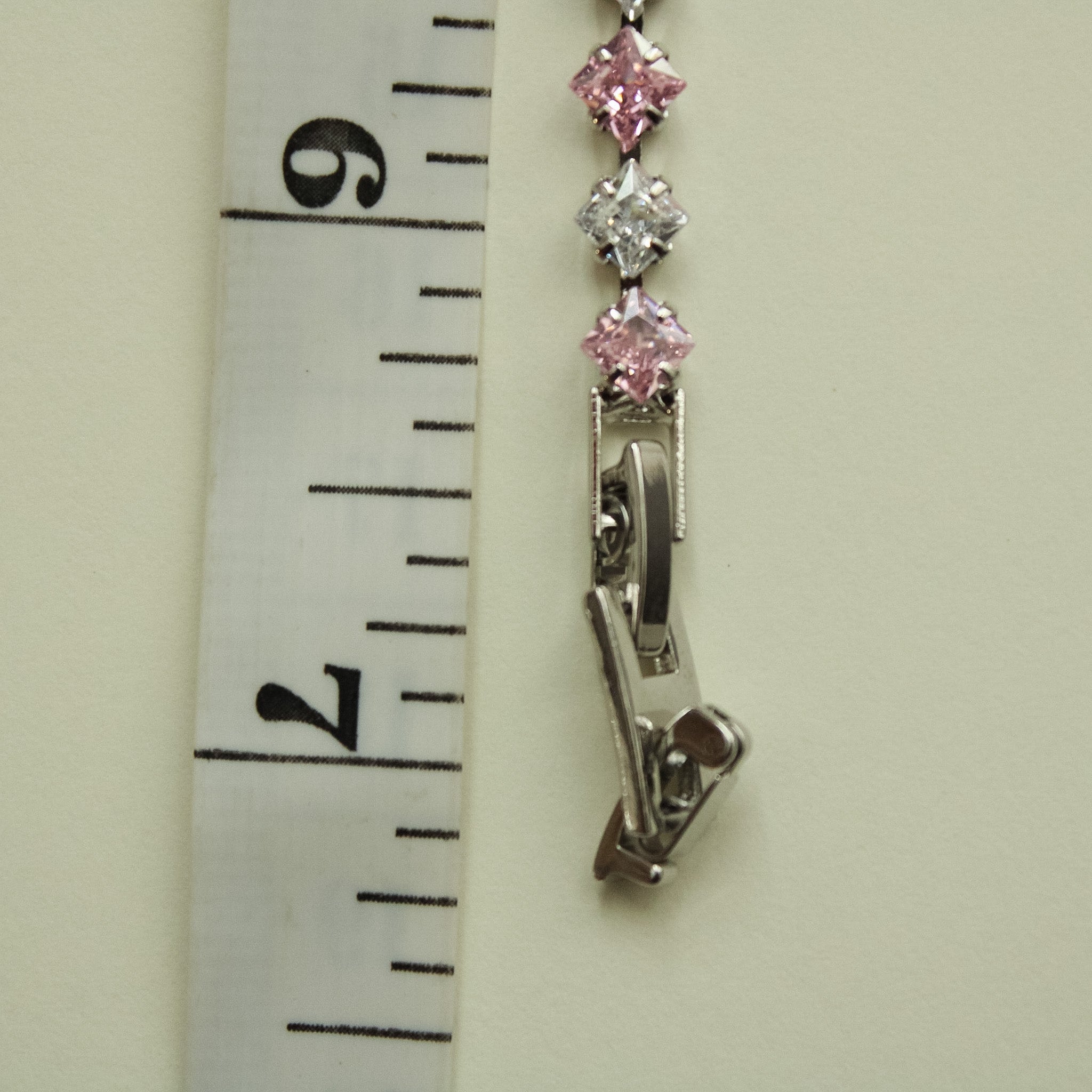 Tennis bracelet clasp with pink and clear princess-cut CZ stones