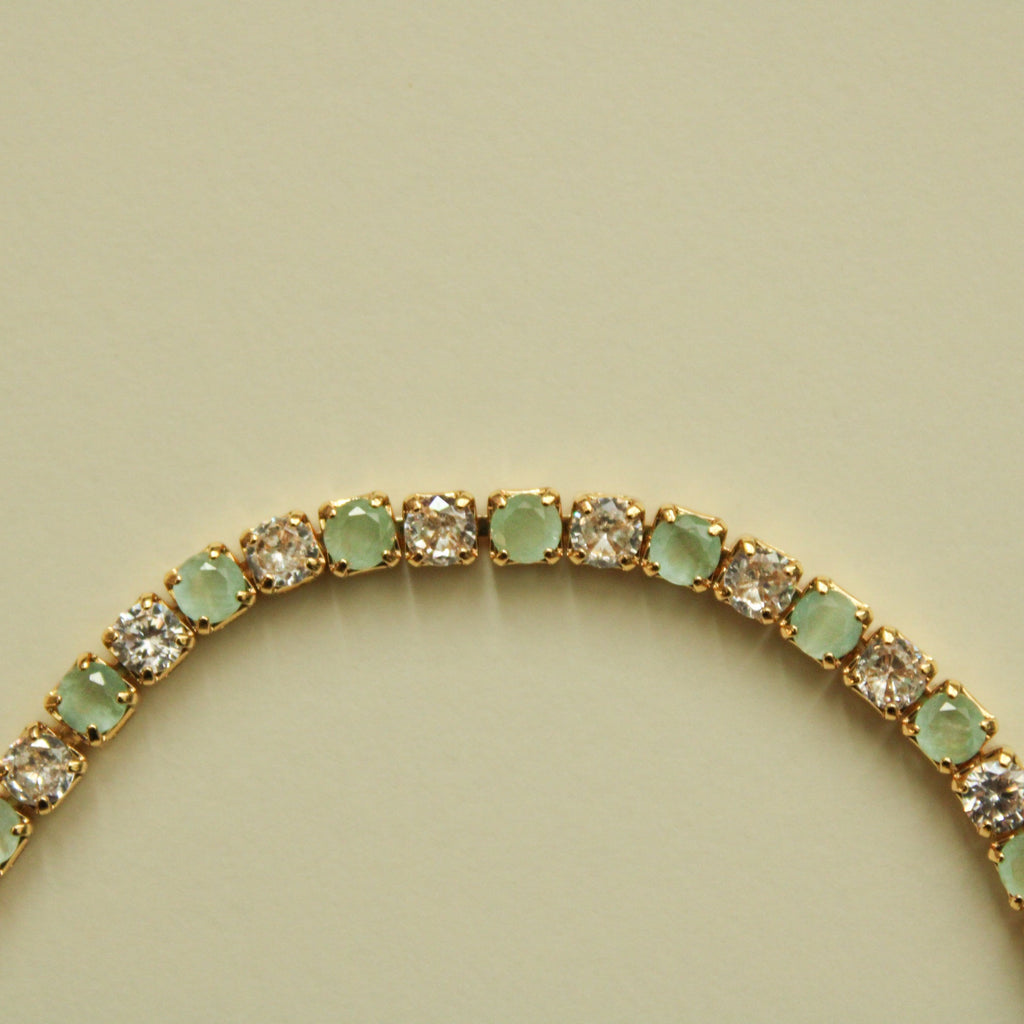 Seafoam green and clear CZ tennis bracelet, close-up of round stones on the band